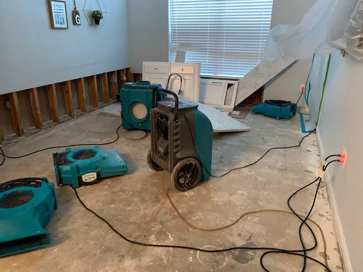 Dehumidifier in flood-cut room for Water Damage Restoration in Merrimack