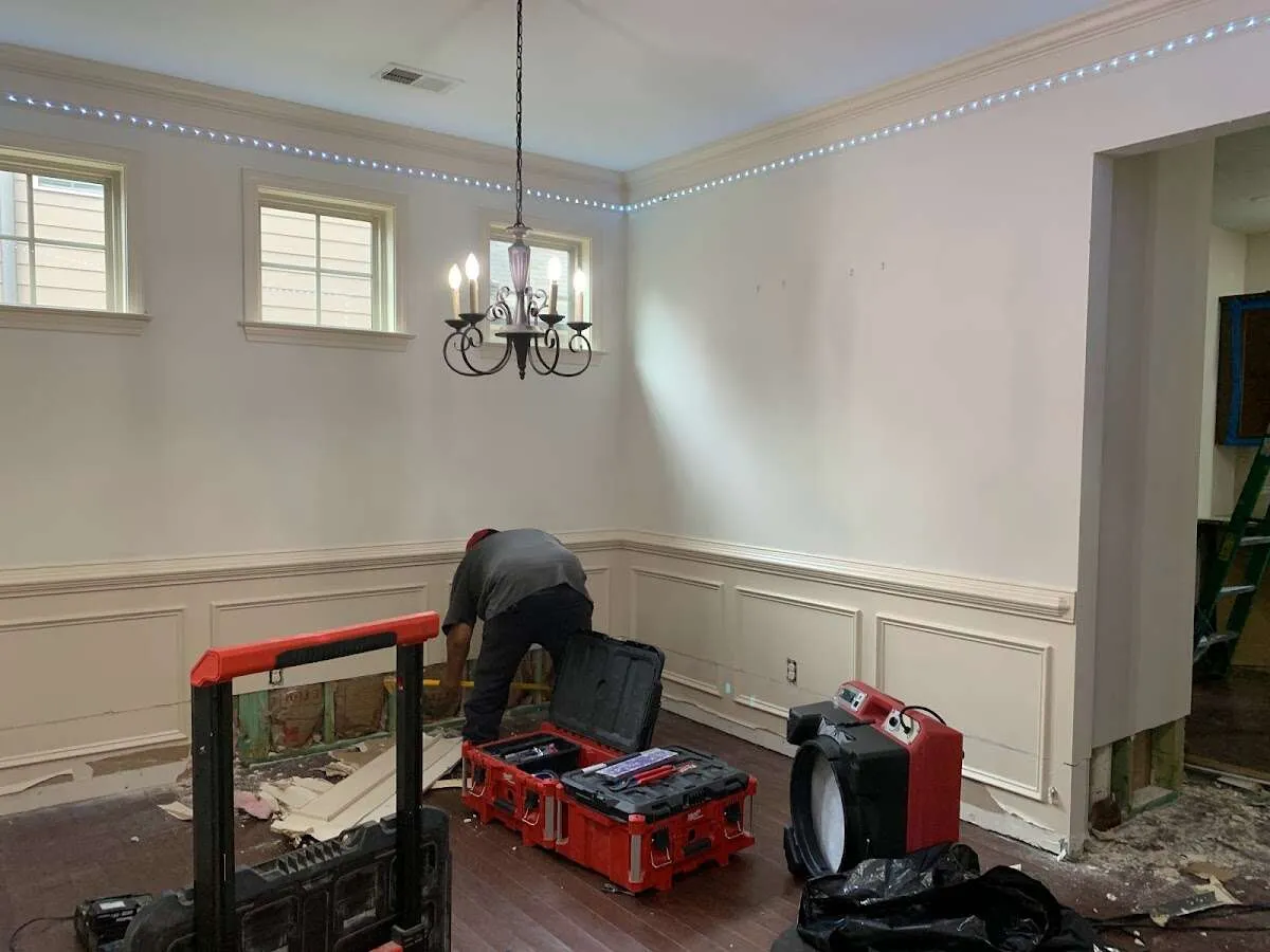 Restoration technician with professional equipment in Merrimack